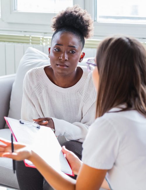 Patient receiving bad news, She is desperate and crying, Doctor support and comforting her patient with sympathy. Don't worry, this medical test is not so bad