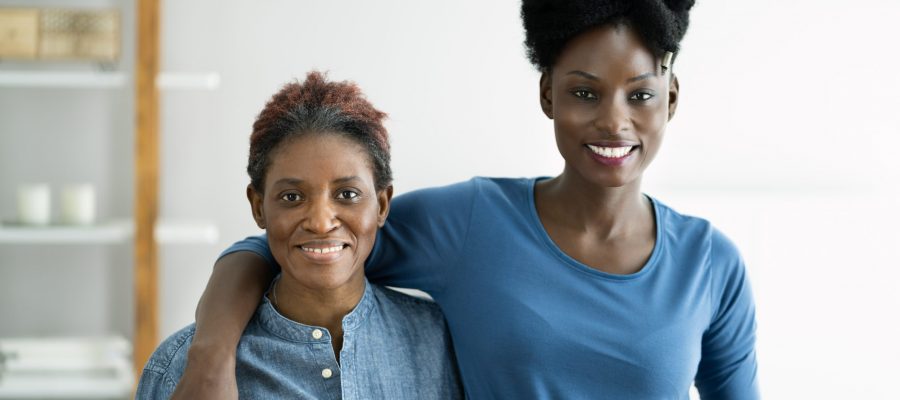 African Teen Support For Elderly Mature Mother