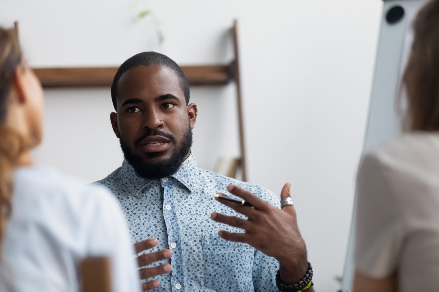 A person contributing during a professional assessment meeting