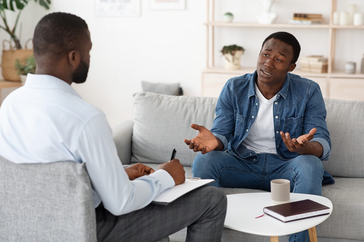 A person speaking with a mental health professional