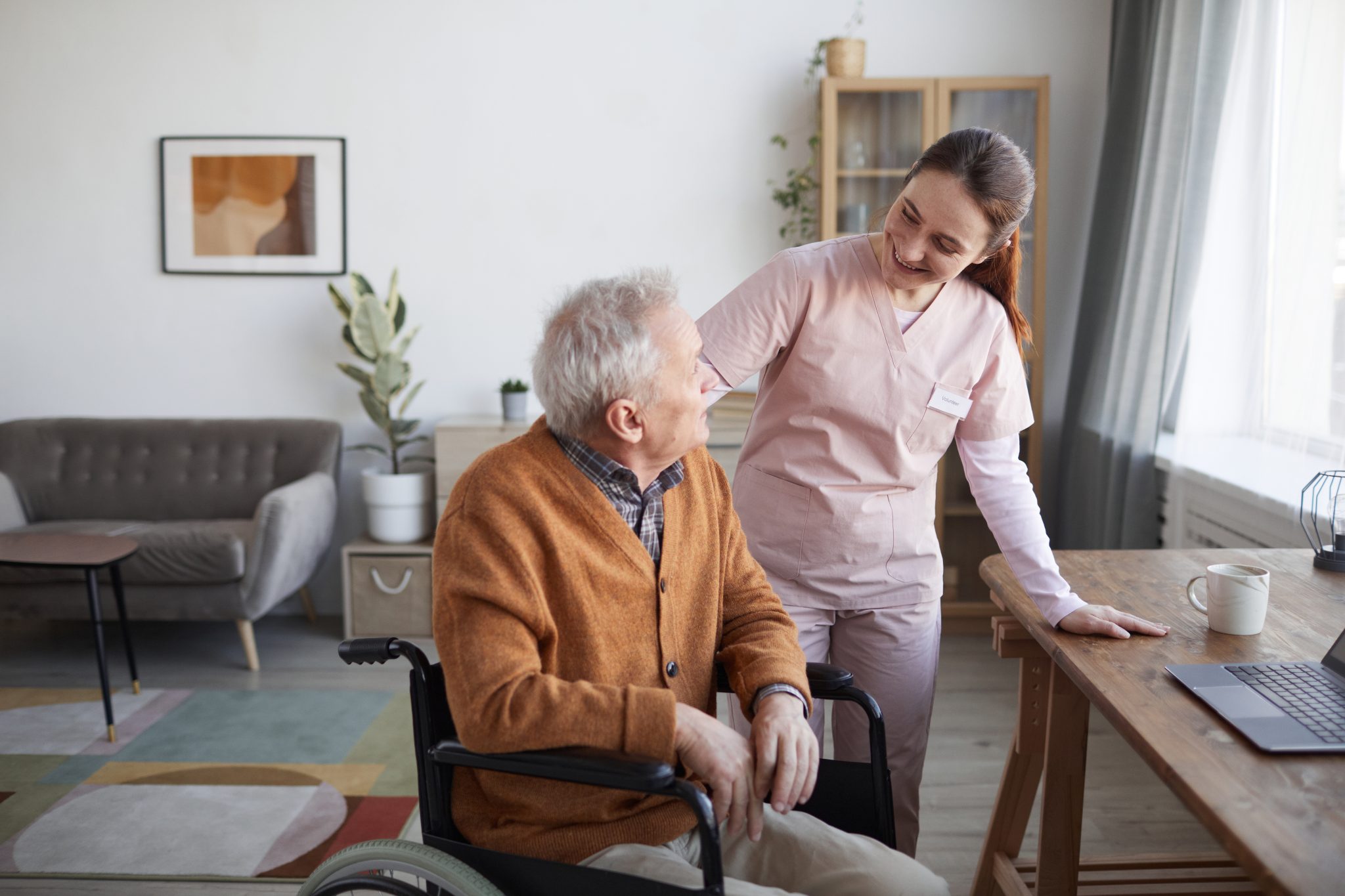 A resident and support worker enjoying time together